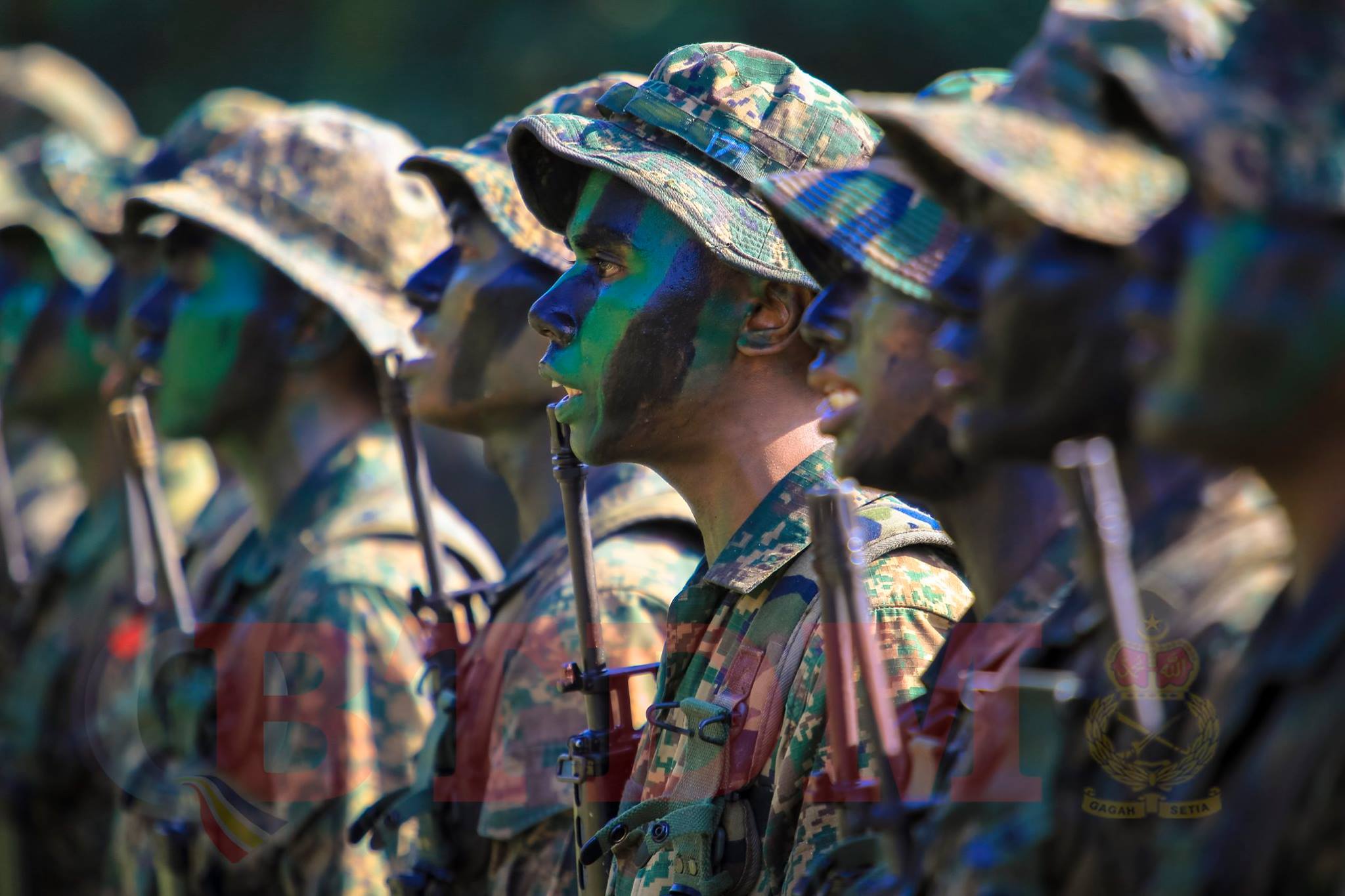 BDTM Online 10. Moments before the graduates are awarded their green beret.
